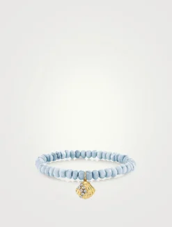 Blue African Opal Beaded Bracelet With Small Gold Clam Shell Charm
