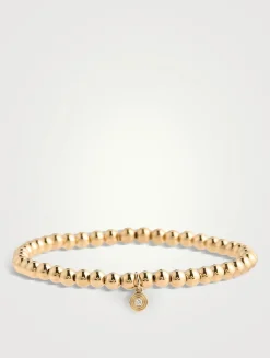 Gold Beaded Bracelet With 14K Gold Small Fluted Diamond Charm