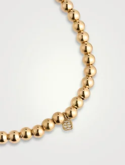 Gold Beaded Bracelet With 14K Gold Small Fluted Diamond Charm