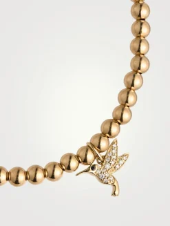 14K Gold Beaded Bracelet With Small 14K Diamond Hummingbird Charm
