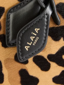 Le Teckel Calf Hair Clutch In Leopard Print