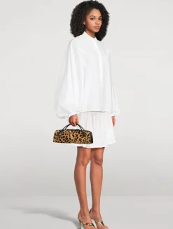 Le Teckel Calf Hair Clutch In Leopard Print