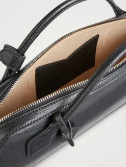 Le Teckel Leather Clutch