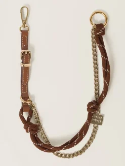 Leather, Cord, And Metal Trick