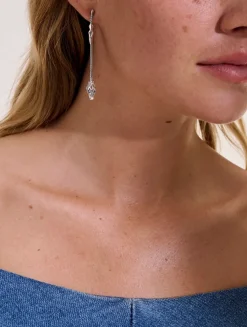 Naga Sterling Silver Linear Earrings With Blue Sapphire Eyes