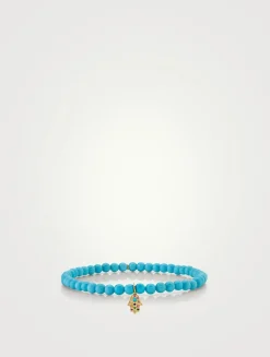 Natural Blue Turquoise Beaded Bracelet With 14K Gold Baby Rainbow Hamsa Charm