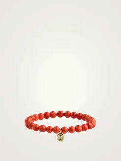 Peach Coral Beaded Bracelet With Fluted 14K Gold Diamond Charm